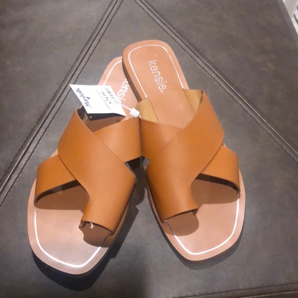 New never wore slip on sandals..